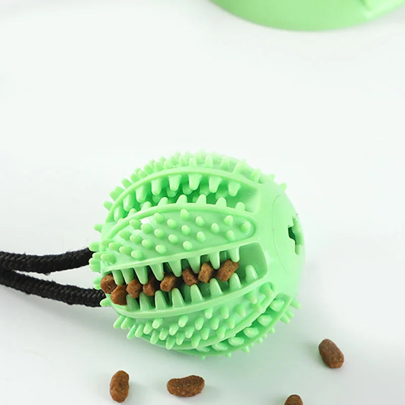 Interactive Suction Cup Dog Toy with Sound and Treat Dispensing - Durable Rubber Ball for Training and Tug-of-War Fun